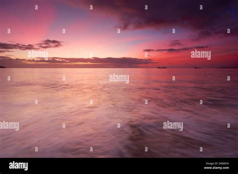 Gyllyngvase beach sunrise Stock Photo - Alamy