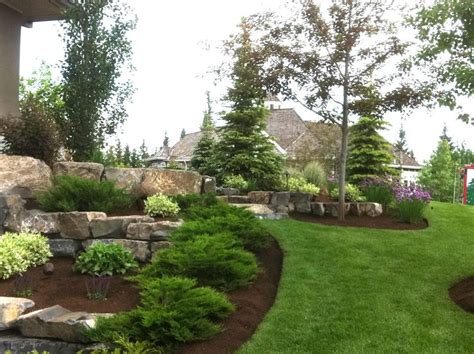 Landscaping with Evergreens | Mountain Pine Estates ~ Landscape | Landscaping with boulders ...