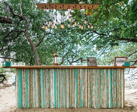 Oversized beach bar with a vintage Edison light bulb plank as lighting ...