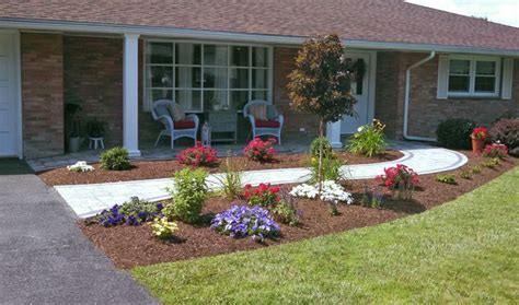 walkway with contrasting border. planting using annuals and perennials ...