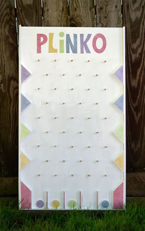 Mini Plinko Game In The Game, Players Drop A Token At The Top Of A ...