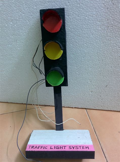 I made this traffic light project with cardboard, LED bulbs, and ...