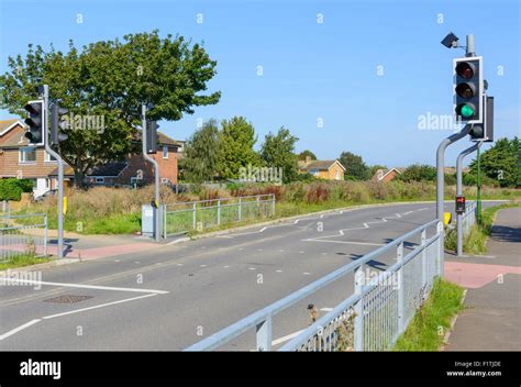 Toucan crossing for pedestrians and cyclists on a road in England UK ...