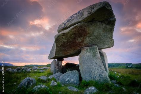 Kilclooney More dolmen at sunset Stock Photo | Adobe Stock