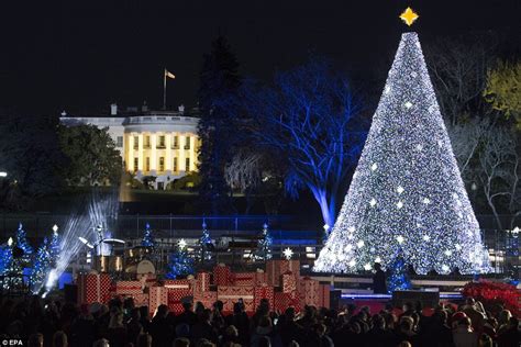 Obama and the First Family light the National Christmas Tree at the ...