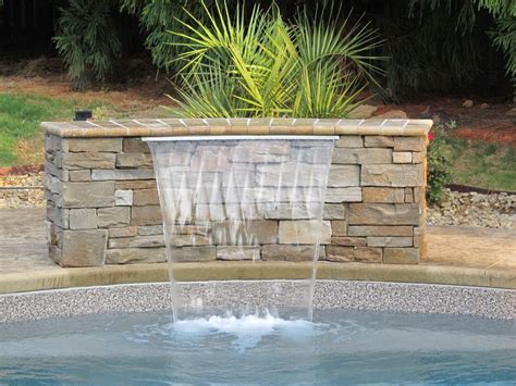 Water features can be added to any swimming pool | Pool water features ...