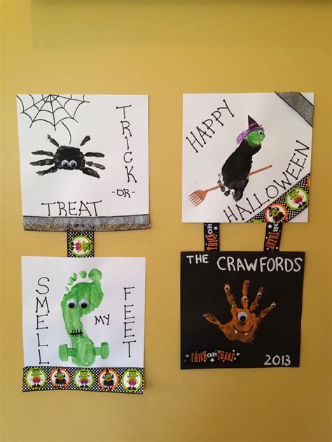 Halloween handprint/footprint craft | Halloween crafts for kids, Halloween crafts, Xmas crafts kids