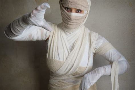 Women Wrapped in Bandages Like Egyptian Mummy Graphic by axel.bueckert · Creative Fabrica