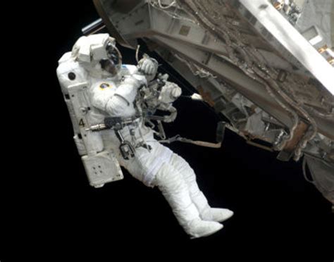 ESA - Astronauts working with Hubble Space Telescope