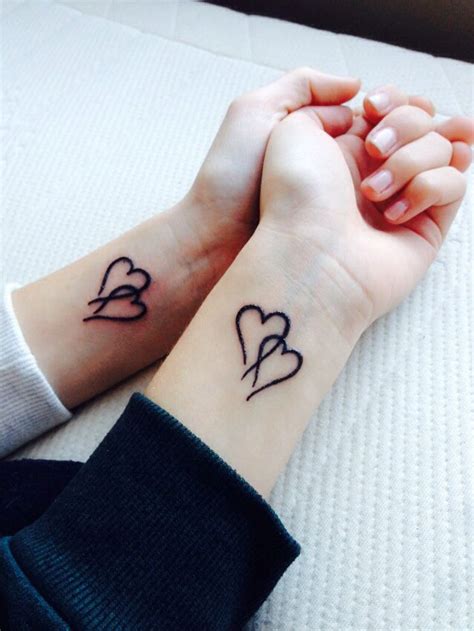 Heart tattoo with best friend of all time | Heart tattoo, Time tattoos, Tattoos