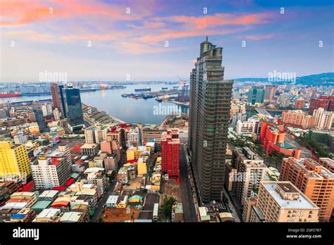 Kaohsiung, Taiwan city skyline towards the harbor at dusk Stock Photo ...