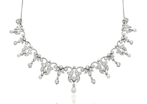 AN EARLY 20TH CENTURY PEARL AND DIAMOND TIARA/NECKLACE | Christie's