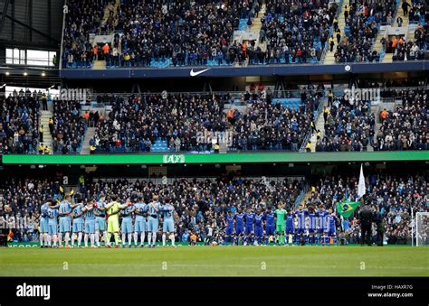 The two team's stand for a minute's silence for the Colombia plane crash victims during the ...