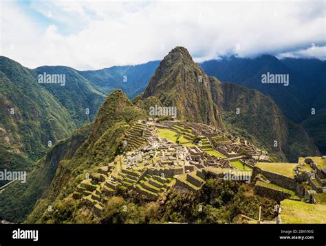 Machu Picchu in the Andes mountains of Peru Stock Photo - Alamy