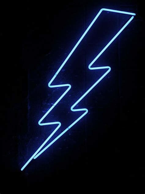 Download A surreal lightning bolt illuminated in neon blue Wallpaper ...