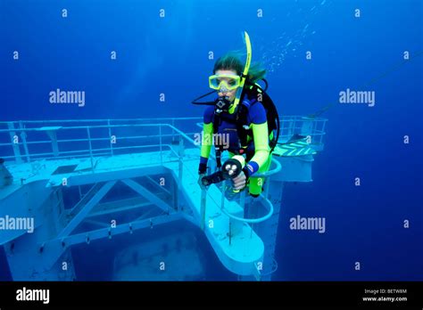 Scuba Diver on Shipwreck Stock Photo - Alamy