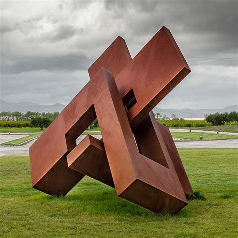 oxidized finish geometric X Reinterpretation shape Spanish Architect cabeza Corten steel ...