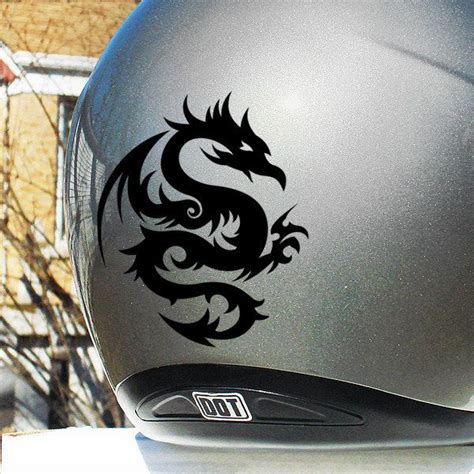 a motorcycle helmet with a dragon decal on it