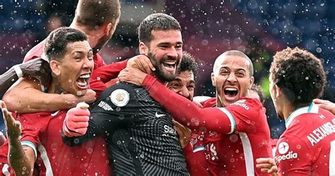 Liverpool goalkeeper Alisson celebrates scoring a goal against West Bromwich Albion at The ...