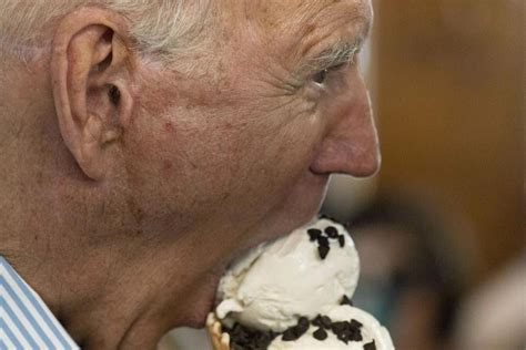 President Joe Biden takes a bite of ice cream.jpeg | | wdrb.com