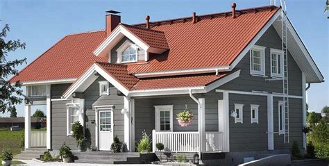 Hanna | Scandinavian Homes Ltd | House paint exterior, Terracotta roof house, Red roof house