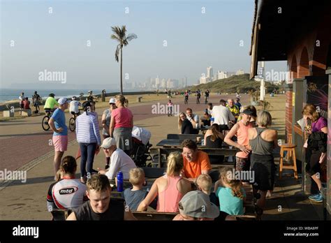 Durban, South Africa, candid street photography, groups, men, women, standing, sitting at ...