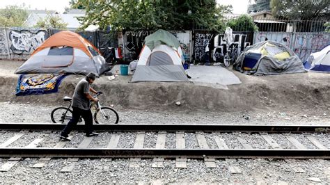 As homeless camps explode in L.A. suburbs, residents fear they will ...