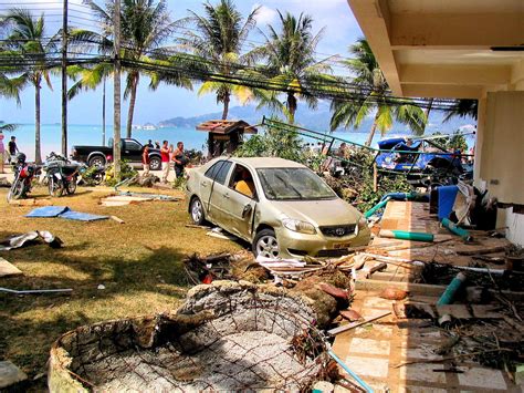 Crashed Car and Destroyed Hotel After Tsunami on Patong Beach in Phuket, Thailand - Encircle Photos