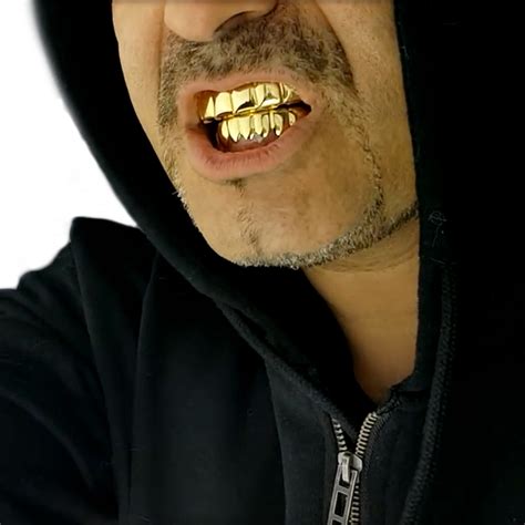 Why Do Rappers Wear Gold Teeth - Live Enhanced