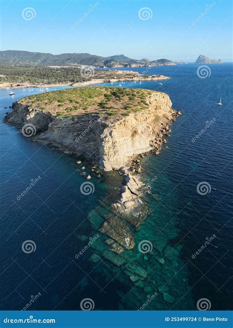 Cala Comte Beach in Ibiza. the Island of Es Vedra Can Be Seen in the ...