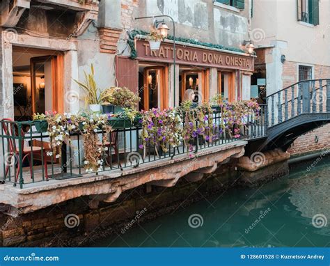 Venice, Italy, a Lonely Tourist on the Terrace of a Restaurant on a Canal Editorial Stock Photo ...