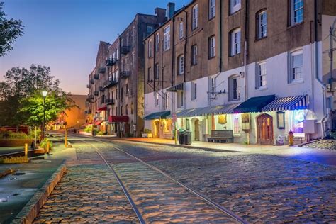 Premium Photo | Shops and restaurants at river street in downtown savannah in georgia