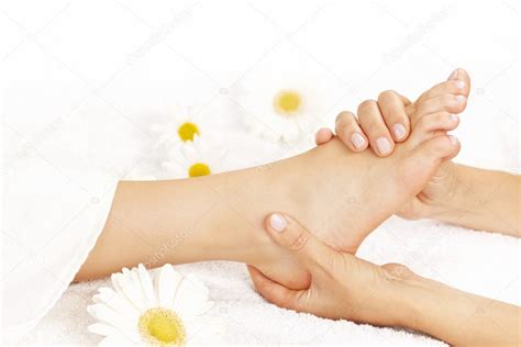 Foot massage Stock Photo by ©elenathewise 7611901