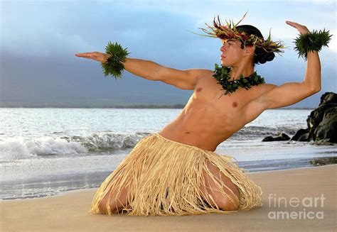 Male Hula Dancer performs on the beach. Photograph by Gunther Allen - Pixels