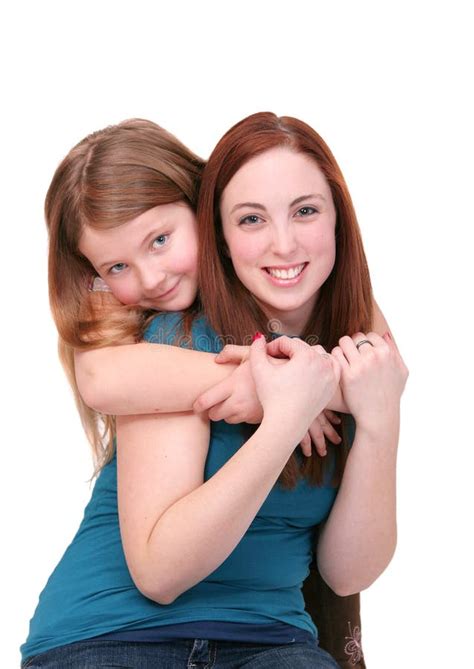 Hugging Sisters stock image. Image of friend, black, cute - 9041271