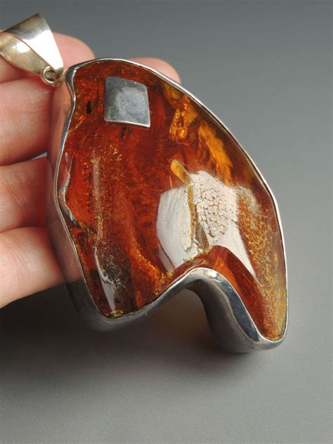 Freeform Baltic amber and sterling pendant | Amber jewelry, Sterling ...