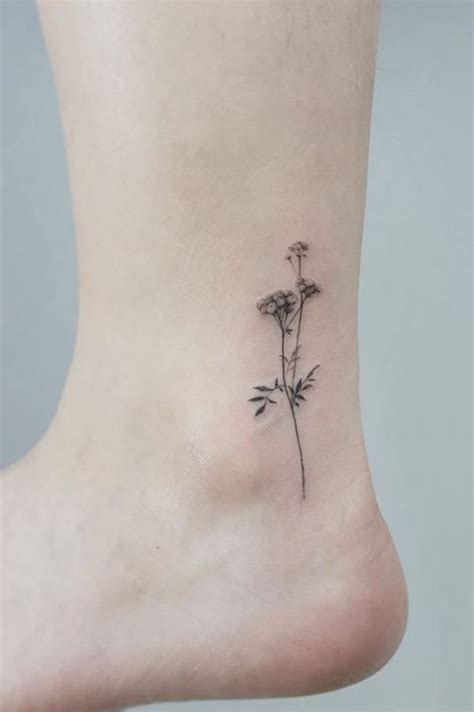 Awesome Tiny Flower Tattoo - InkStyleMag | Tiny flower tattoos, Flower tattoo, Small tattoos