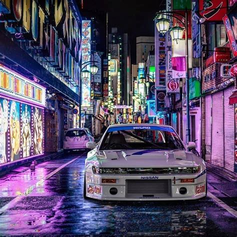 Download JDM Cars On Colorful Side Street Wallpaper | Wallpapers.com