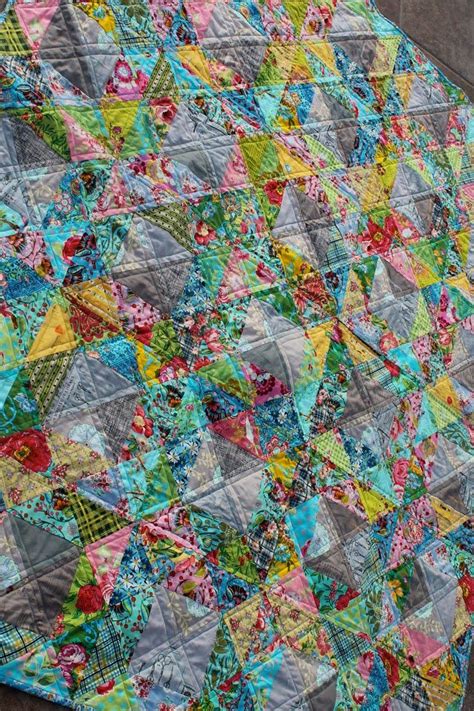 A quarter square triangle quilt | Triangle quilt, Quilts, Scrappy quilts