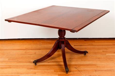 Sold Price: Duncan Phyfe Style triple pedestal dining table - October 6, 0120 9:30 AM EDT