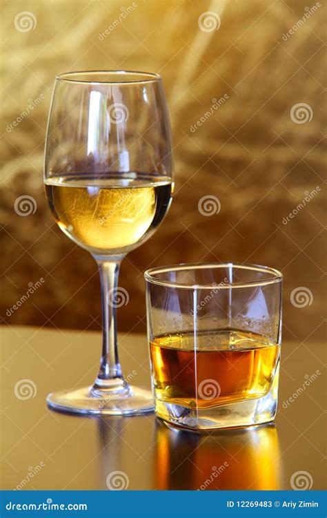 Glass Of White Wine And Whiskey Stock Photos - Image: 12269483