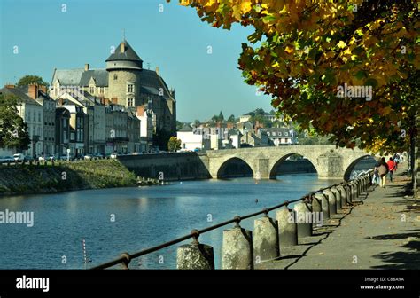 Castle of Laval city in Mayenne (Pays de la Loire, France). The river ...