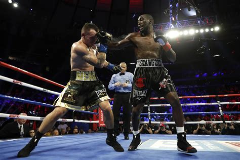 Crawford stops Kavaliauskas to defend welterweight title | AP News