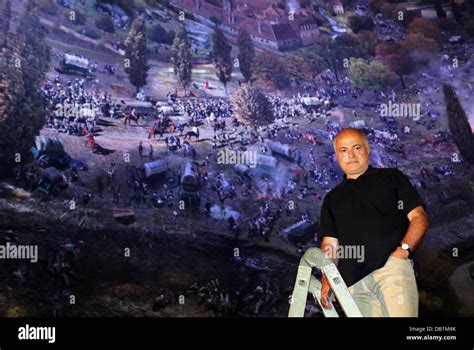 Leipzig, Germany. 22nd July, 2013. Artist Yadegar Asisi poses in front ...