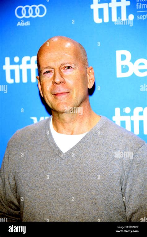 US actor Bruce Willis poses before the press conference of "Looper ...