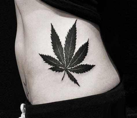 Cannabis leaf tattoo by Guillaume Martins | Photo 24444