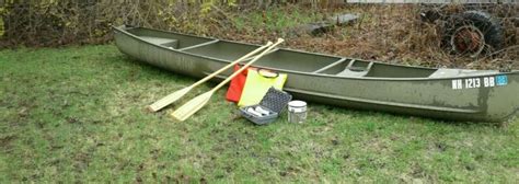 Grumman 17' Square Stern Canoe With Accessories. for sale from United States