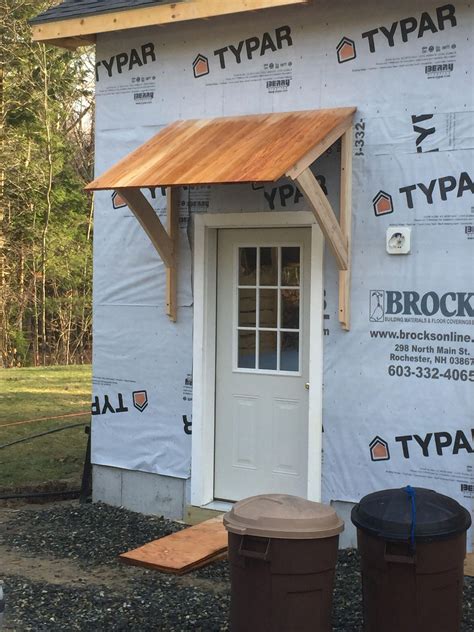 Dazzling timber awning #timberawning | Door overhang, Porch awning, Front door overhang