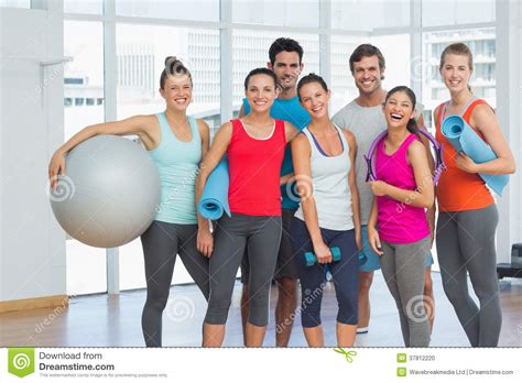 Fit People Smiling In A Bright Exercise Room Stock Photo - Image: 37812220