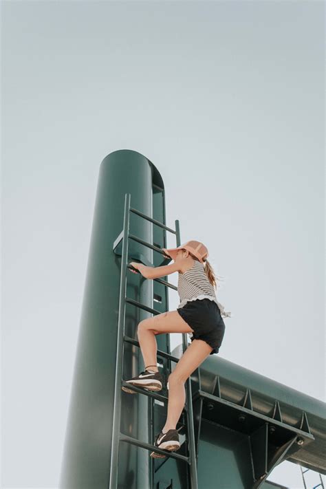 People Woman Climbing Ladder Person Image Free Photo